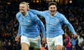 Julián Álvarez (right) celebrates with fellow goalscorer Erling Haaland after Manchester City’s winner.