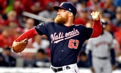 Sean Doolittle pitches during the seventh inning in game five of the World Series