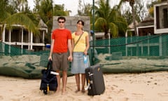 Tourist Couple at Destroyed Resort