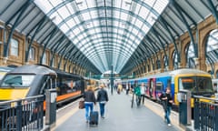 Two trains arriving departing from at King’s Cross station