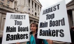 Protester outside the Bank of England on 15 September 2018, the 10th anniversary of the collapse of Lehman Brothers