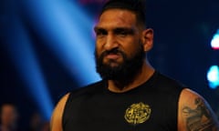 Former NBA player turned professional wrestler Satnam Singh looks on during a recent AEW Rampage appearance.