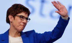 Annegret Kramp-Karrenbauer waves after giving her speech at the CDU conference.