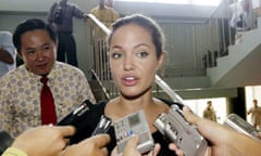 Angelina Jolie Pitt<br>FILE - In this July 6, 2014, file photo, actress Angelina Jolie Pitt speaks to Cambodian reporters during a visit to Phnom Penh, Cambodia. Angelina Jolie Pitt first came to Cambodia 16 years ago to film Lara Croft: Tomb Raider, - the gun-toting, bungee-jumping, supremely toned action hero that made her a star. Shes back now for another movie, First They Killed My Father, as a director, and the subject matter is a far cry from Lara Croft. (AP Photo/Andy Eames, File)