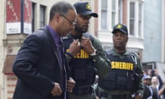 Caesar Goodson<br>Officer Caesar Goodson, left, one of six Baltimore city police officers charged in connection to the death of Freddie Gray, arrives at a courthouse before receiving a verdict in his trial in Baltimore, Thursday, June 23, 2016. (AP Photo/Patrick Semansky)