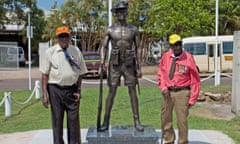 A 2018 picture of the unveiling of a statue commemorating the Torres Strait Light Infantry Battalion with Mebai Warusam (left) and Awati Mau
