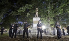 Police surround the ‘Silent Sam’ Confederate monument during a protest to remove the statue at the University of North Carolina in Chapel Hill