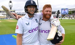 Joe Root and Jonny Bairstow leave the field in triumph.