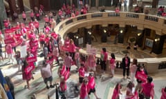 protesters dressed in pink in Wisconsin capitol building