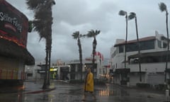 man on a street in storm