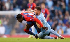 Aymeric Laporte fouls Wilfried Zaha before being sent off.