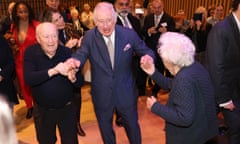 King Charles III dances at the at the JW3 community centre.