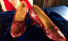 FILE - A pair of ruby slippers once worn by actress Judy Garland in the "The Wizard of Oz" sit on display at a news conference on Sept. 4, 2018, at the FBI office in Brooklyn Center, Minn. A man charged with the long-ago museum heist of the pair of ruby slippers was expected to change his plea to guilty at a court hearing Friday, Oct. 13, 2023 shedding light on a whodunnit mystery dating back 18 years. (AP Photo/Jeff Baenen, File)