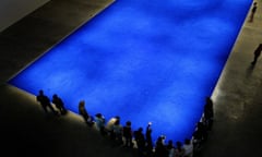 People view an exhibition by French artist Yves "Monochrome" Klein at the Guggenheim museum in Bilbao<br>A group of school children observe an untitled work made of pure intense ultramarine pigment, part of the exhibition of French artist Yves "Monochrome" Klein,  at the Guggenheim Museum in Bilbao, northern Spain,  February 1, 2005.  The exhibition, a retrospective of the brief but intense career of the influential French artist, began Tuesday and runs until May 2nd.  REUTERS/Vincent West