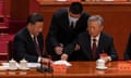 Closing Ceremony Of The 20th National Congress Of The Communist Party Of China<br>BEIJING, CHINA - OCTOBER 22: Chinese President Xi Jinping looks on as former President Hu Jintao, right, touches papers in front of Xi as he is helped to leave early from the closing session of the 20th National Congress of the Communist Party of China, at The Great Hall of People on October 22, 2022 in Beijing, China. (Photo by Kevin Frayer/Getty Images)