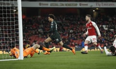Leroy Sané runs the ball past Petr Cech for Manchester City’s third goal against Arsenal at the Emirates Stadium on Thursday.