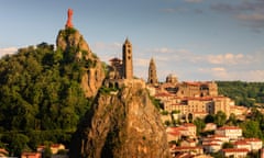 Statue of Notre Dame de France with Saint Michel d'Aiguilhe Chapel and Notre Dame Cathedral Le Puy en Velay Haute-Loire Auvergne-Rhone-Alpes France<br>M68CGW Statue of Notre Dame de France with Saint Michel d'Aiguilhe Chapel and Notre Dame Cathedral Le Puy en Velay Haute-Loire Auvergne-Rhone-Alpes France