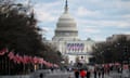 US-POLITICS-UNREST-PROTEST<br>People walk down Pennsylvania avenue near the US Capitol, between fences set up for the inauguration in Washington, DC on January 17, 2021, during a nationwide protest called by anti-government and far-right groups supporting US President Donald Trump and his claim of electoral fraud in the November 3 presidential election. - The FBI warned authorities in all 50 states to prepare for armed protests at state capitals in the days leading up to the January 20 presidential inauguration of President-elect Joe Biden. (Photo by Andrew CABALLERO-REYNOLDS / AFP) (Photo by ANDREW CABALLERO-REYNOLDS/AFP via Getty Images)