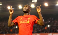 Liverpool's Christian Benteke celebrates scoring against Chelsea