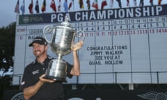 Jimmy Walker poses with the trophy after winning at Baltusrol.