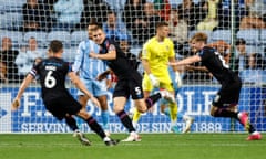 Michal Helik (centre) celebrates after scoring a goal for Huddersfield against Coventry in the Championship.