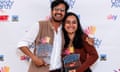 Ahir Shah and Urooj Ashfaq smile as they hold Edinburgh comedy awards