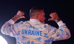 The boxer Oleksandr Usyk pictured from behind wearing a tracksuit saying 'Ukraine'