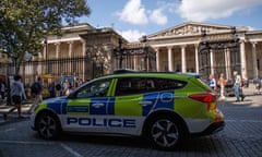 A police car patrols around the British Museum in London on 17 August.