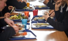 Pupils eating school lunch