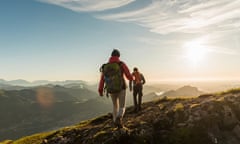 Couple hiking in the mountains in Salzkammergut, Austria