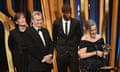 Cillian Murphy, Christopher Nolan, Charles Roven and Emma Thomas accept the best film Bafta for Oppenheimer on stage.