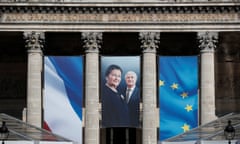 Auschwitz survivor and French minister Simone Veil and her late husband Antoine Veil on a giant banner on the Pantheon in Paris. 