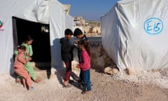 Children  at a displacement camp for earthquake survivors in the Syrian town of Darat Izza near Aleppo.