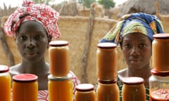  Women sell mango and sweet potato jam at the food processing shop in Bantantinnting, Senegal. They produced the jam with a Multifunctional Platform Project (MFP) introduced by the United Nations Development Programme (UNDP), helping women and girls to no longer spend several hours a day gathering firewood or collecting water. MFP is a diesel engine to which a variety of end-use equipment can be attached, including grinding mills, battery chargers, vegetable or nut oil presses, welding machines and carpentry tools.