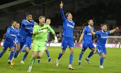 Gillingham players celebrate their 6-5 victory on penalties against Brentford in the Carabao Cup third round.