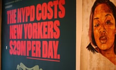 An installation shot from the Museum of Broken Windows with text saying the nypd costs new yorkers $29m a day and Breonna Taylor's face