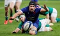 France’s Francois Cros is tackled by Ireland’s Caelan Doris before he can score.