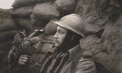 A French soldier of the 92th Infantry Regiment holding an eagle owl, circa 1916.
