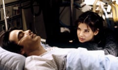 Peter Gallagher as Peter and Sandra Bullock as Lucy in While You Were Sleeping