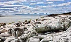 Jura<br>Looking across the Sound of Jura to the Isle of Jura from the Kintyre peninsula on the west coast of Scotland.  The distinctive Paps of Jura are the mountains on the horizon.