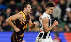 Collingwood star Nick Daicos tries to outrun his tagger, Hawthorn midfielder Finn Maginness, in the round 21 AFL match at Melbourne Cricket Ground.