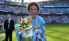 Leroy Sané, Premier League title winner, celebrates with the spoils.