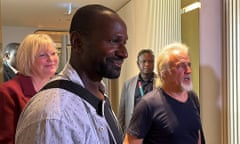 NIGER-MALI-FRANCE-CONFLICT-MISSING<br>French journalist Olivier Dubois (3rd L), freed nearly two years after he was kidnapped by the Support Group for Islam and Muslims (GSIM) in Mali, and US national Jeffery Woodke (R), freed after being kidnapped in October 2016 in Niger, are seen as they arrive at the Diori Hamani International Airport in Niamey on March 20, 2023. (Photo by Souleymane AG ANARA / AFP) (Photo by SOULEYMANE AG ANARA/AFP via Getty Images)