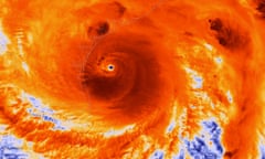 Hurricane Harvey Reaches Texas’ Gulf Coast<br>UNITED STATES - AUGUST 25: In this NOAA handout image, the NOAA/NASA Suomi NPP satellite captures this infrared image of Hurricane Harvey just prior to making landfall at 18:55 UTC on August 25, 2017 along the Texas coast. NOAA’s National Hurricane Center has clocked Harvey’s maximum sustained winds at 110 miles per hour with higher gusts. Infrared images like this one can help meteorologists identify the areas of the greatest intensity within large storm systems, such as the areas with the most intense convection, known as overshooting cloud tops (dark orange), surrounding the eye and along the outer bands. (Photo by NOAA via Getty Images)