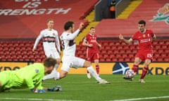Diogo Jota fires into an empty net to open the scoring for Liverpool in their victory against Midtjylland at Anfield.