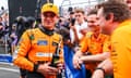 Lando Norris celebrates pole position with his McLaren team at the Hungaroring.