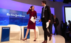 Sheryl Sandberg and New York Times journalist Andrew Ross Sorkin arrive at the World Economic Forum in Davos on 20 January 2016