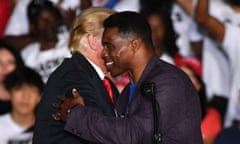 Herschel Walker and Donald Trump hold a rally in Perry, Georgia.