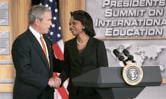 epa00607785 U.S. President George W. Bush (L) shakes hands with Secretary of State Condoleezza Rice prior to making remarks to the U.S. University Presidents Summit on International Education at the U.S. State Department in Washington, DC Thursday 05 January 2006. The summit, which is being hosted by Rice and Secretary of Education Margaret Spellings, is intended to initiate a dialogue with leaders of U.S. higher education on the need to attract foreign students and promote American study abroad. EPA/MATTHEW CAVANAUGH