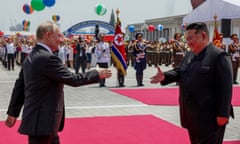 Russian President Putin and North Korea's leader Kim Jong-un shake hands during the official welcome ceremony in Pyongyang, North Korea.